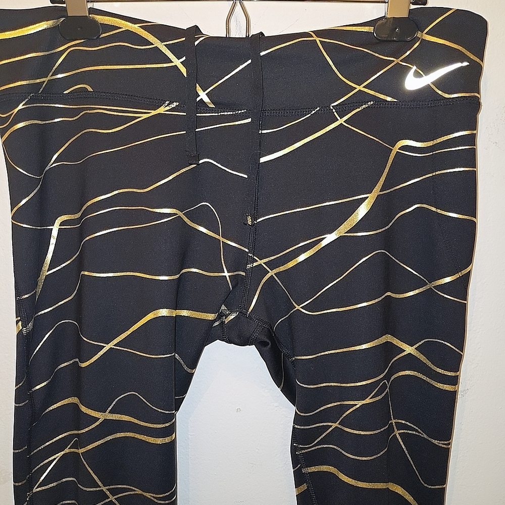 Nike Kids Black and Gold Leggings